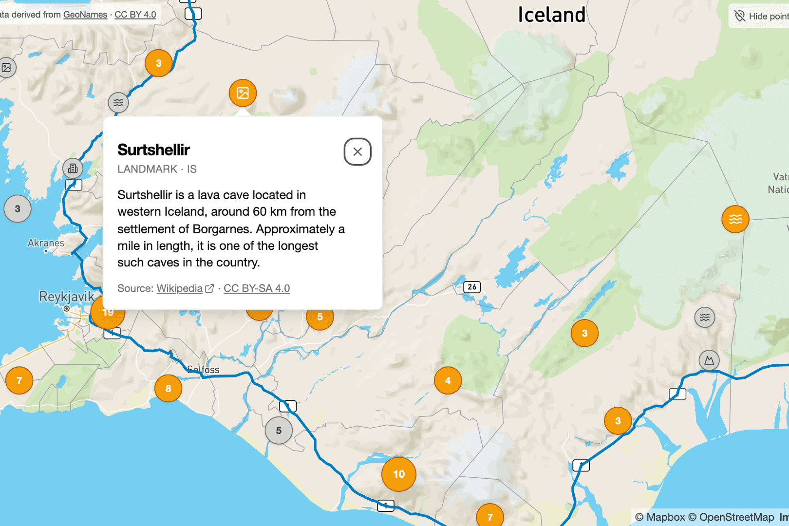 A route map showing points of interest markers along the Ring Road in Iceland.
